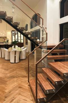 floating-mono-stringer-stair-walnut-treads-keuka-studios